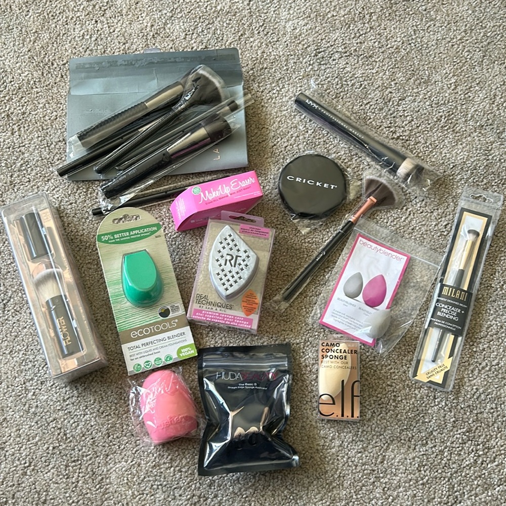 Bundle of new makeup brushes and beauty blending sponges